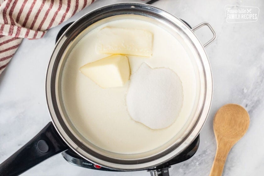 Ingredients for homemade caramel in a heavy saucepan.