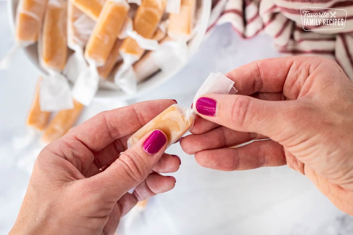 Wrapping a piece of Mom's homemade caramels with waxed paper.