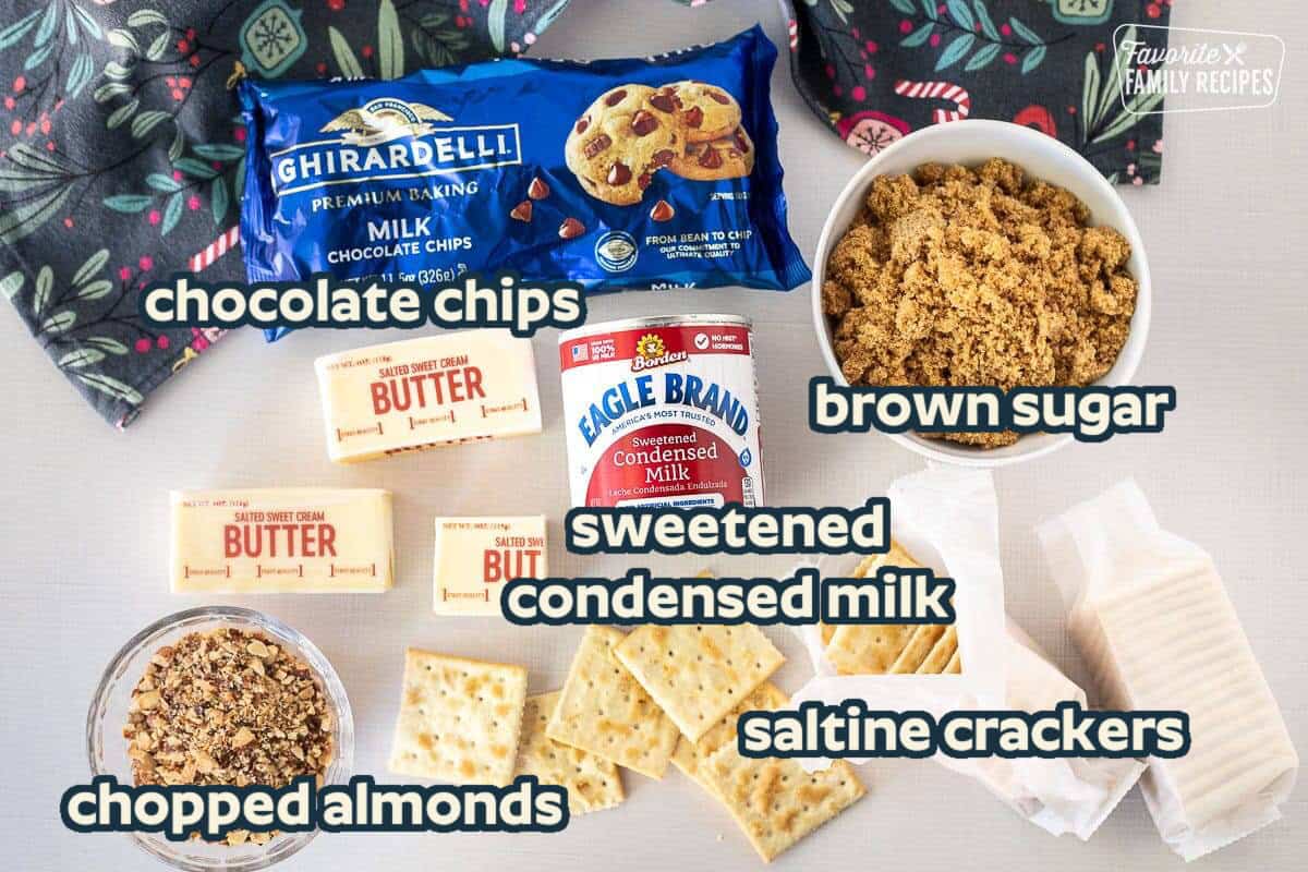 This Christmas Crack Candy is a popular treat and perfect gift for the holidays. It tastes like fancy Almond Roca candy with a sweet, salty flavor and highly addictive crunchy texture. Ingredients to make Saltine Cracker Toffee including butter, chopped almonds, brown sugar, sweetened condensed milk, saltine crackers and milk chocolate chips.