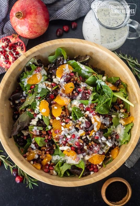 Christmas salad with spring mix, feta, candied pecans, pomegranate, mandarin oranges, dried cranberries and poppyseed dressing.