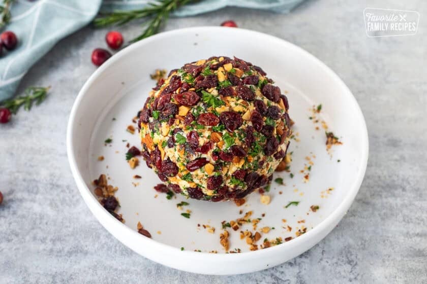 Cheese ball rolled in dried cranberries, parsley and chopped almonds.