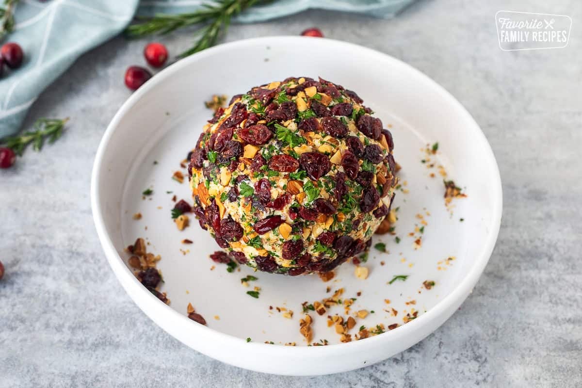 Cheese ball rolled in dried cranberries, parsley and chopped almonds.