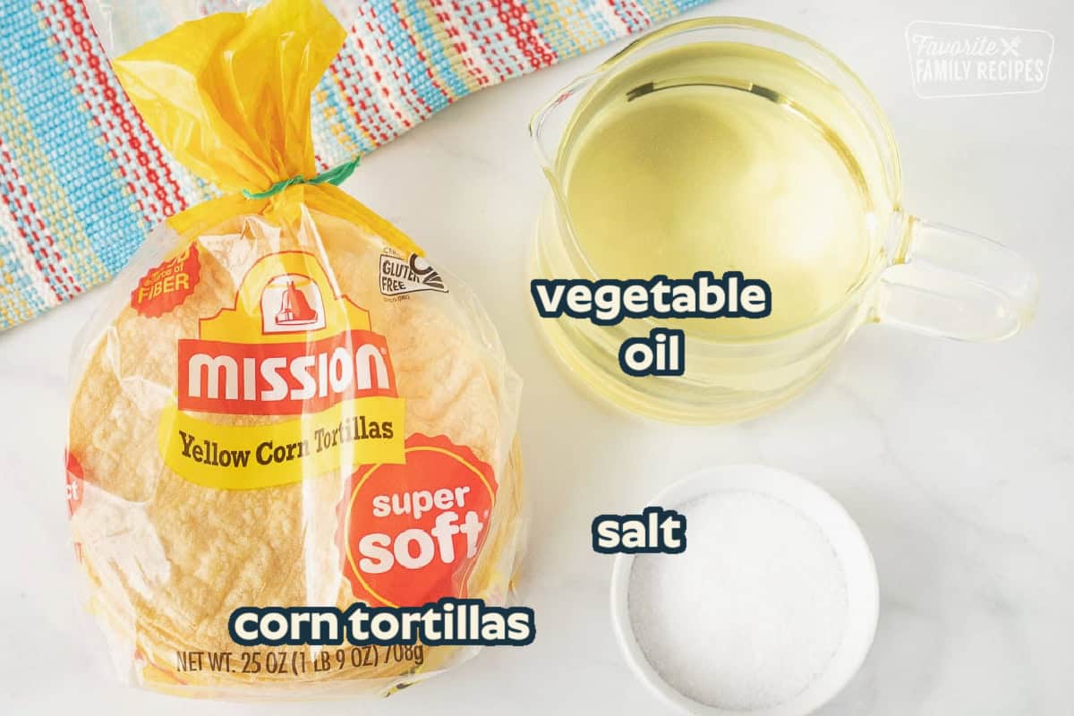 Ingredients to make Tortilla Strips including yellow corn tortillas, oil and salt.