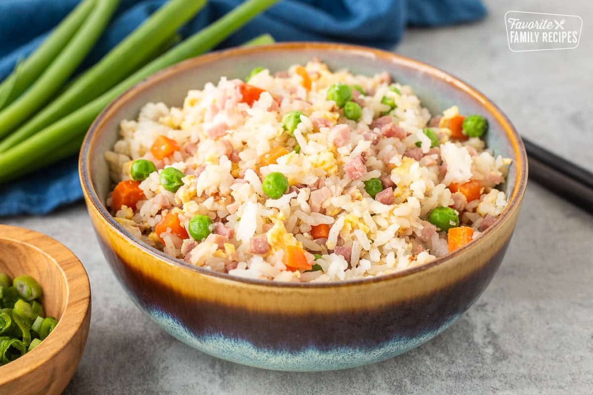Bowl of Ham Fried Rice with ham, egg, peas and carrots.