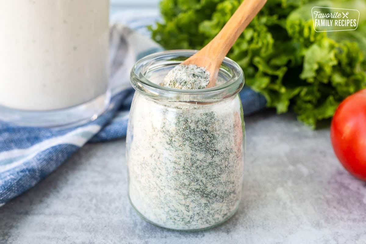 Jar of Hidden Valley Ranch Dressing Mix and a spoon.
