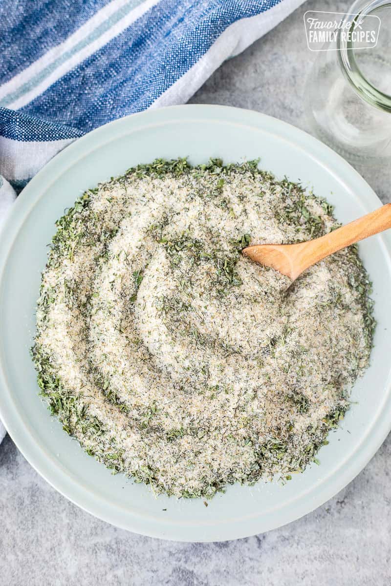 Dish of Hidden Valley Ranch Dressing Mix combined with a spoon.