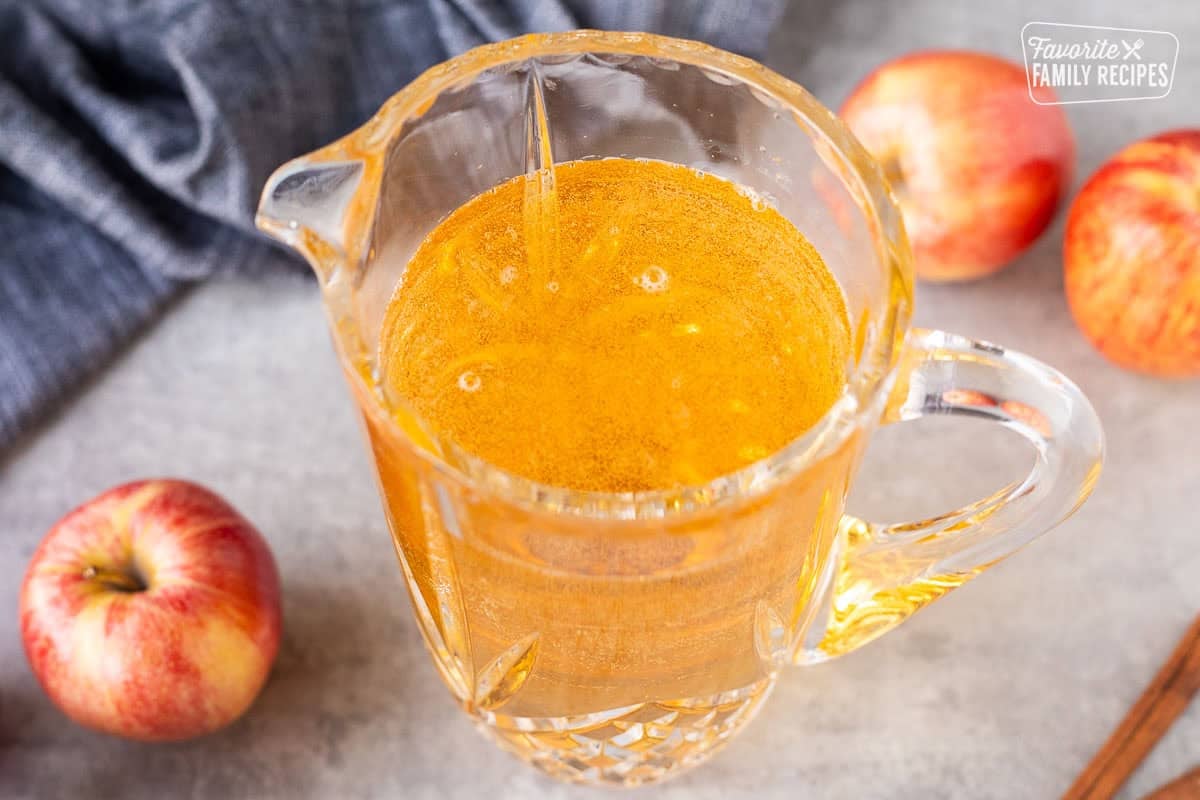 Sparkling Cider in a glass pitcher.