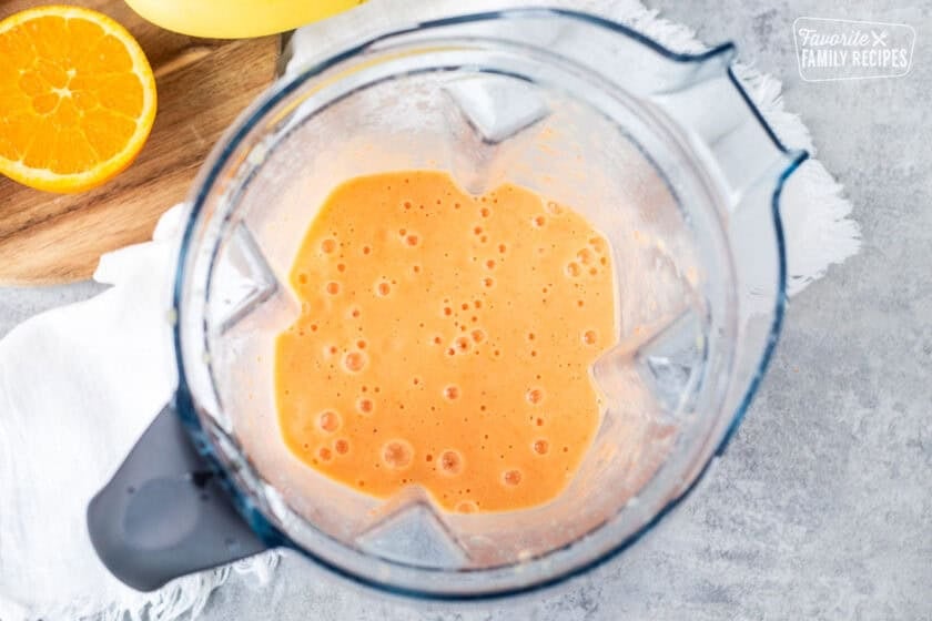 Blender with golden detox smoothie.