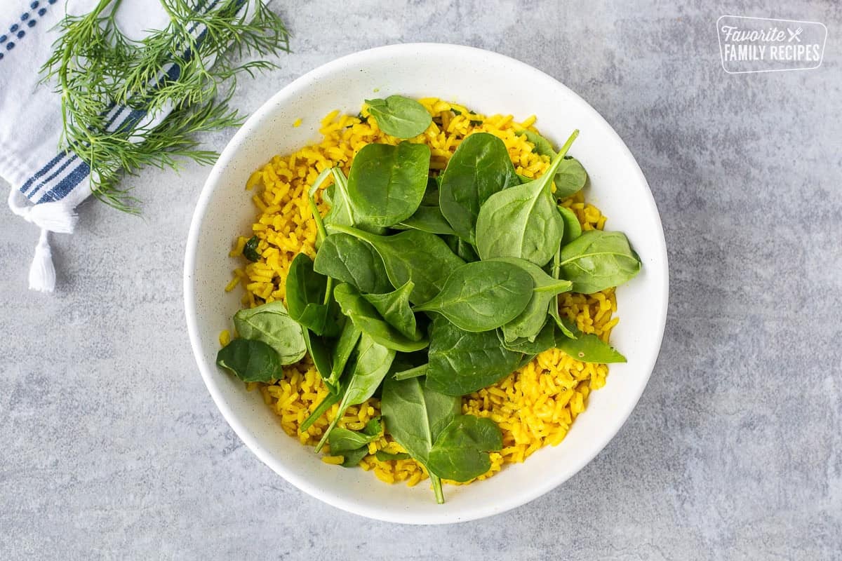 Base layer of Mediterranean Bowl with rice and spinach.