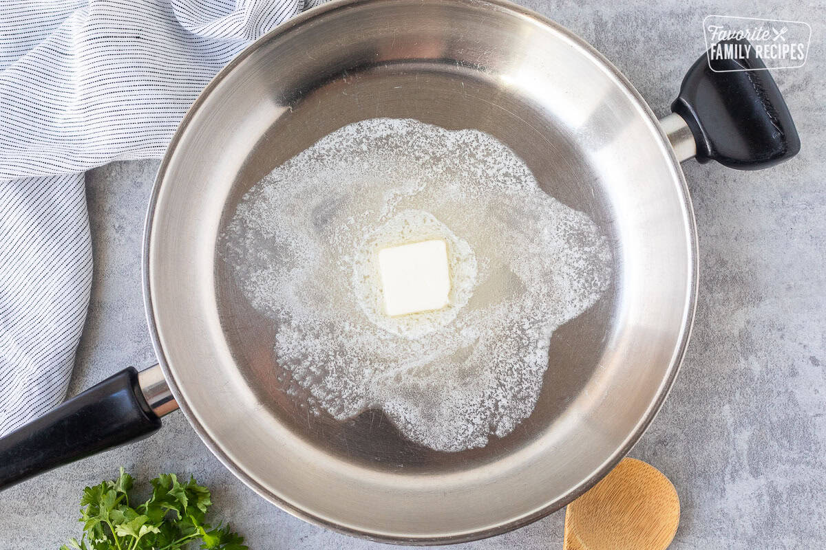 Skillet with melted butter.