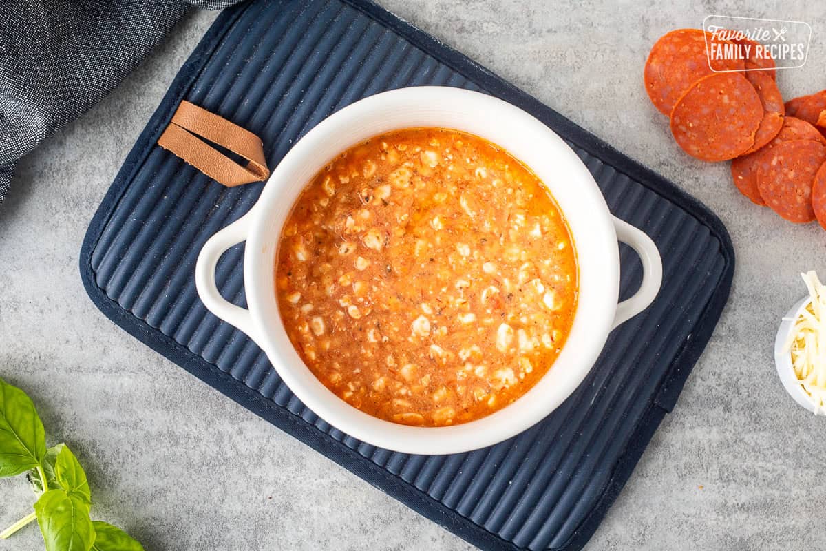 Baked cottage cheese mixture in a ramekin bowl.
