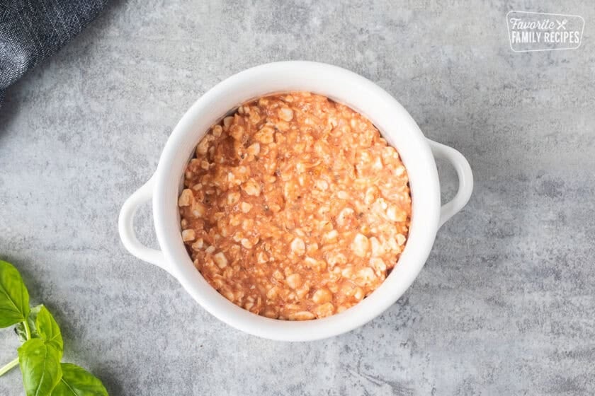 Cottage cheese pizza mixture in a ramekin bowl.
