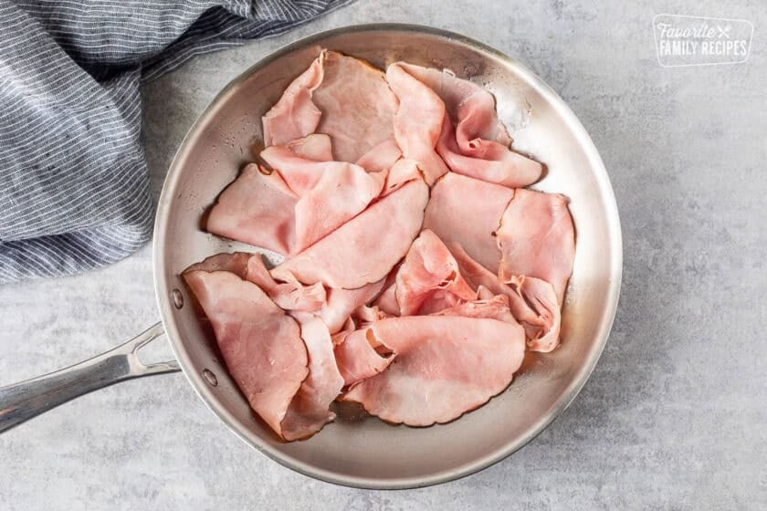 Skillet with heated ham.