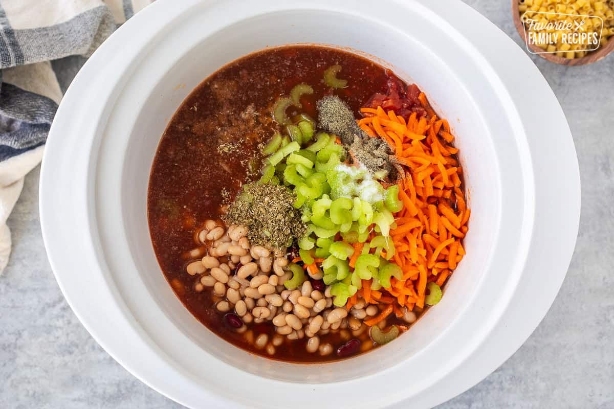 Crock pot with ingredients for pasta e fagipoli added.