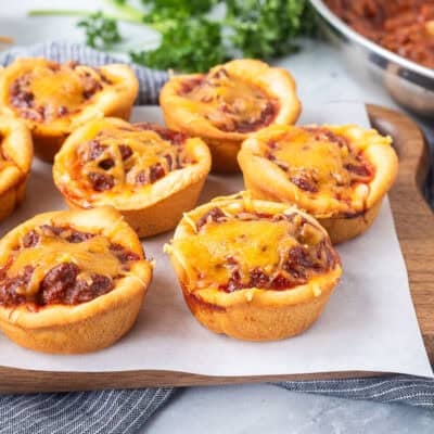 Sloppy Joe Biscuits sprinkled with cheddar cheese.