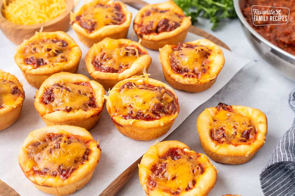 Sloppy Joe Biscuits sprinkled with cheddar cheese.