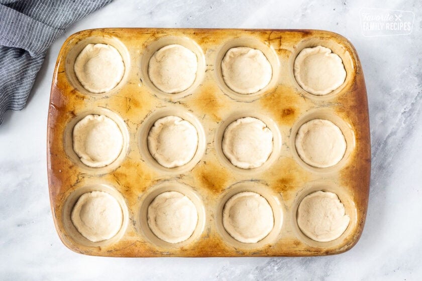 Refrigerated buiscut in muffin pan.