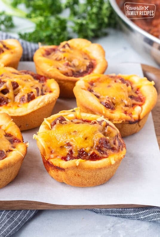 Sloppy Joe Biscuits sprinkled with cheese on top.
