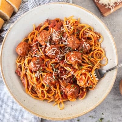 Spaghetti and meatballs stirred with pasta.