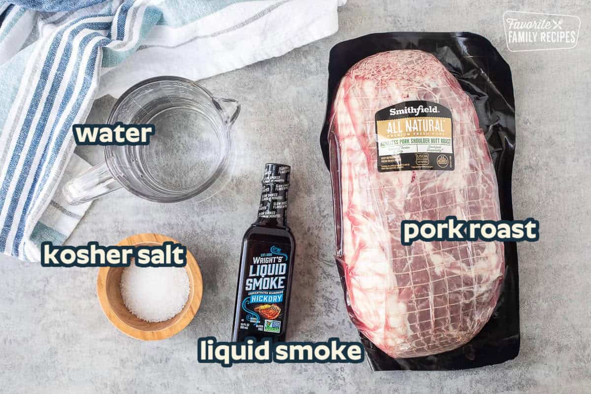 Ingredients to make the kalua pork for pulled pork sandwiches. Including a pork roast, kosher salt, liquid smoke, and water.