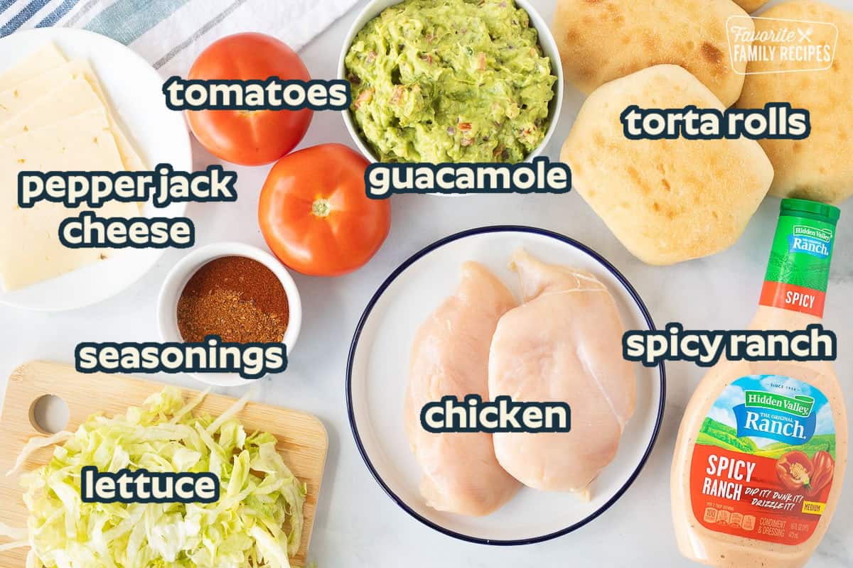 These Guacamole Chicken Torta Sandwiches are my kind of Mexican food! Seasoned grilled chicken on Torta bread loaded with guacamole, lettuce, tomatoes, and chipotle ranch dressing. Ingredients to make Chicken Tortas including chicken breasts, torta bread, guacamole, pepper jack cheese, lettuce, tomatoes, seasonings and spicy ranch.