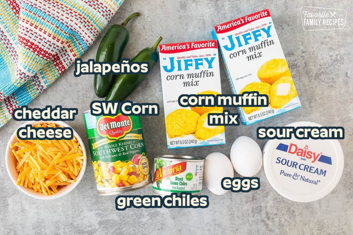 Ingredients to make Mexican Cornbread including Jiffy corn muffin mix, sour cream, eggs, diced green chilies, southwest corn, jalapeños and cheese.