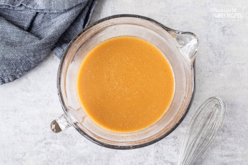 Small bowl of velvet chicken marinade.