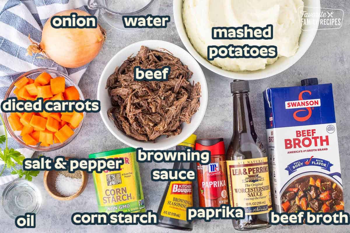 Ingredients to make Beef Goulash including shredded beef, beef broth, mashed potatoes, Worcestershire sauce, paprika, browning sauce, corn starch, onion, water, carrot, salt, pepper and oil.