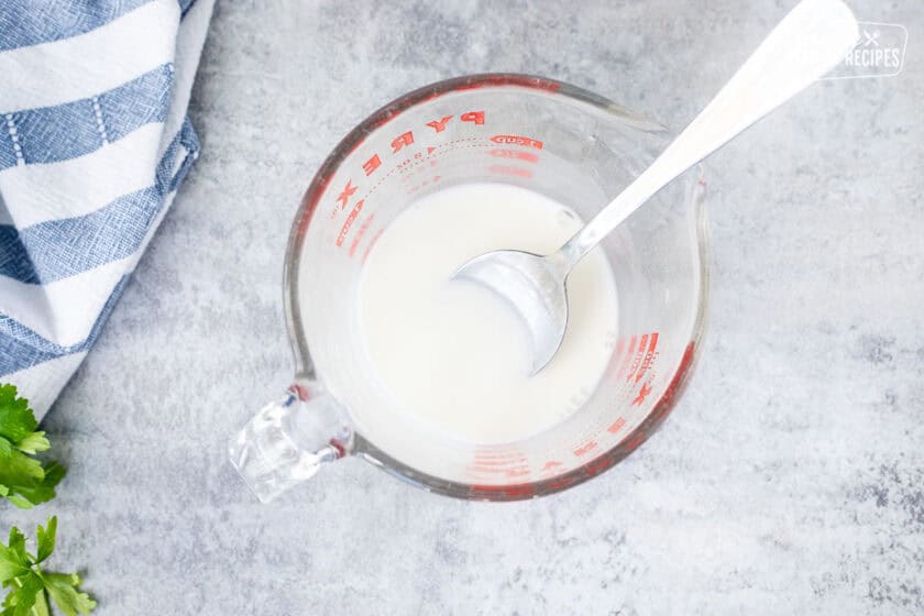 Small bowl with corn starch and water combined.