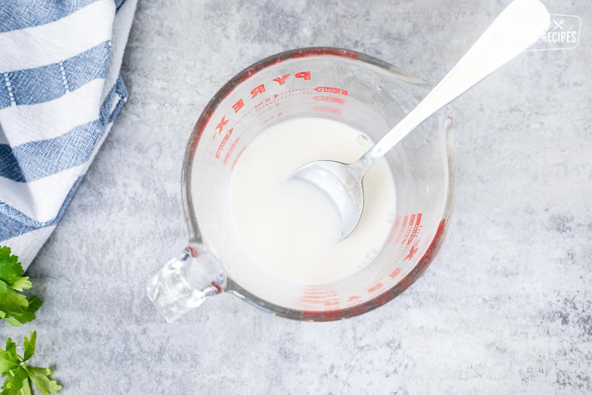 Small bowl with corn starch and water combined.