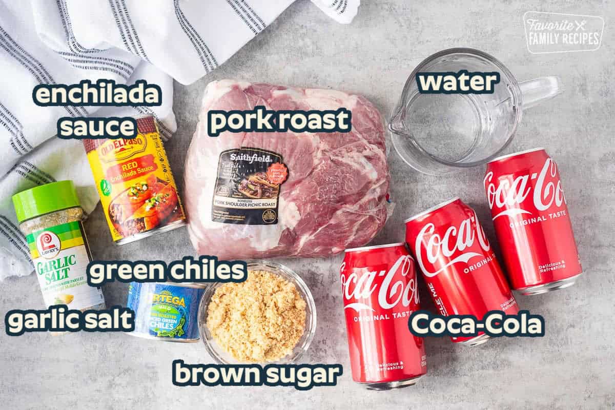 Ingredients to make Cafe Rio sweet pork including Coca Cola, water, pork roast, brown sugar, green chiles, red enchilada sauce and garlic salt.