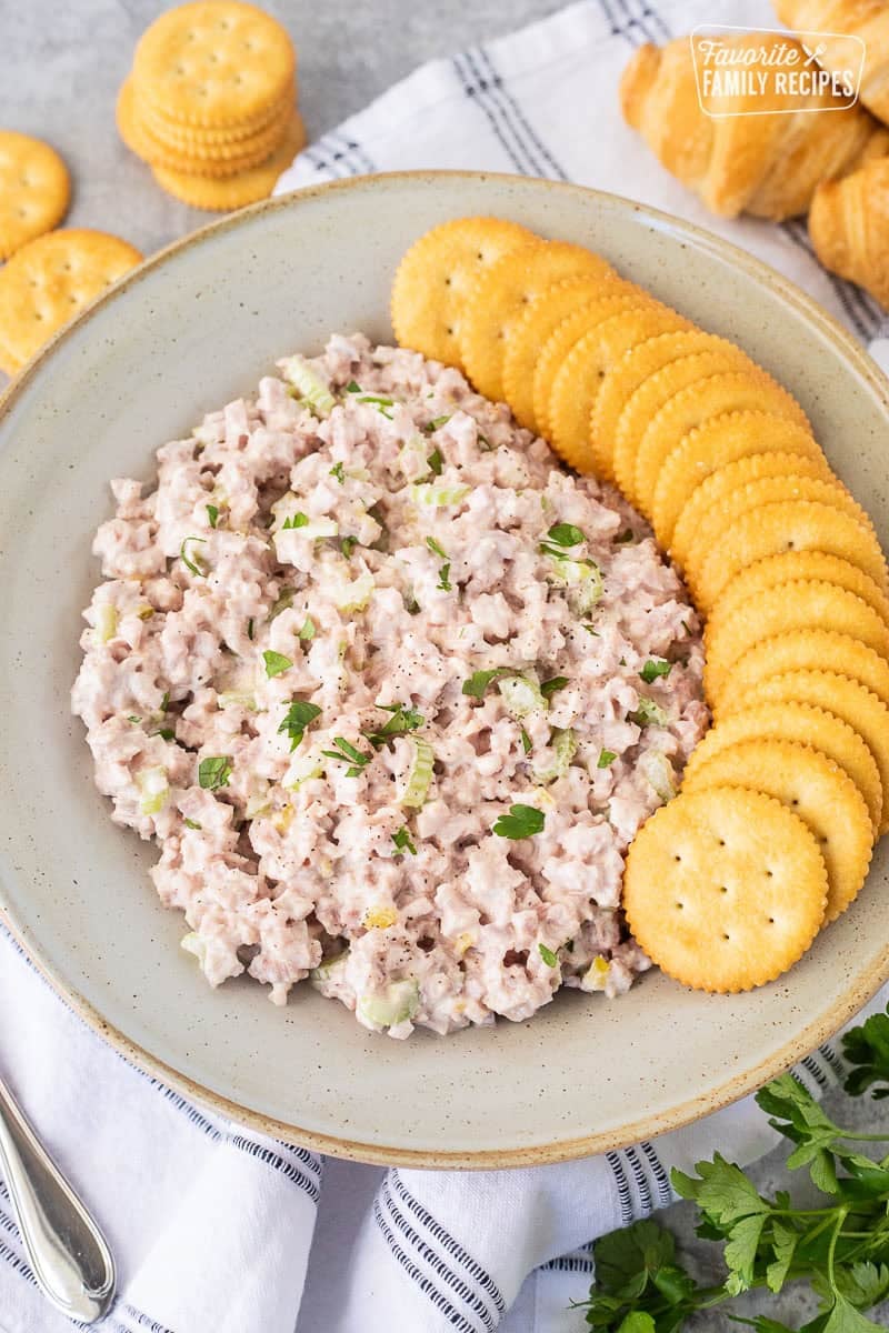 Ham Salad in a bowl with crackers.