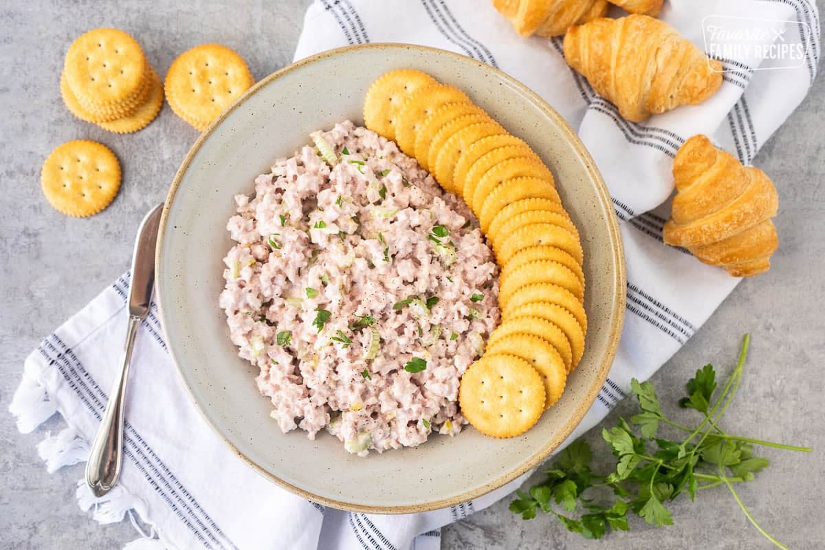 This ham salad recipe is a quick and tasty lunch. It’s so good, you’ll want to eat it straight from the bowl - and you can with crackers! Creamy old-fashioned ham salad served in a bowl with crackers for dipping and spreading.