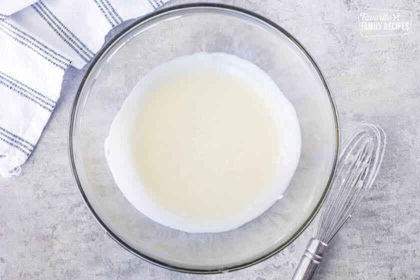 Melted butter and shortening in a large glass bowl and whisk on the side.
