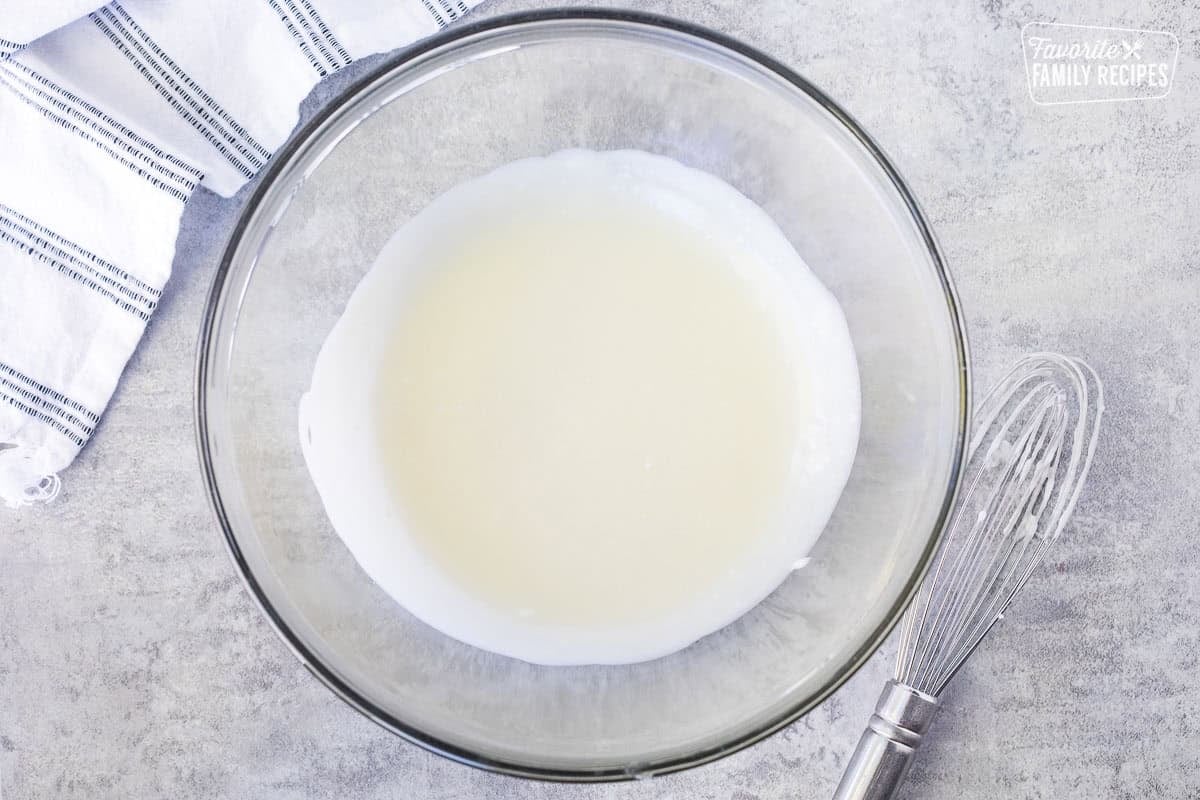 Melted butter and shortening in a large glass bowl and whisk on the side.