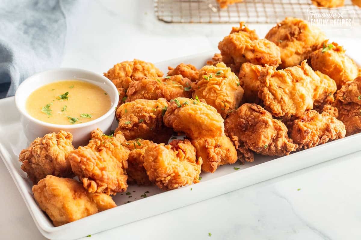 Tray of Mafa Chicken with dipping sauce.