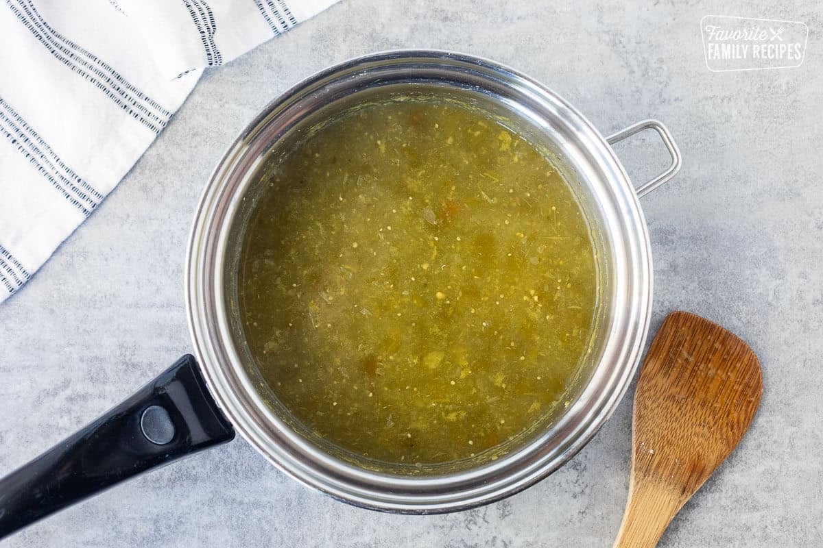 Sauce pan with green sauce.