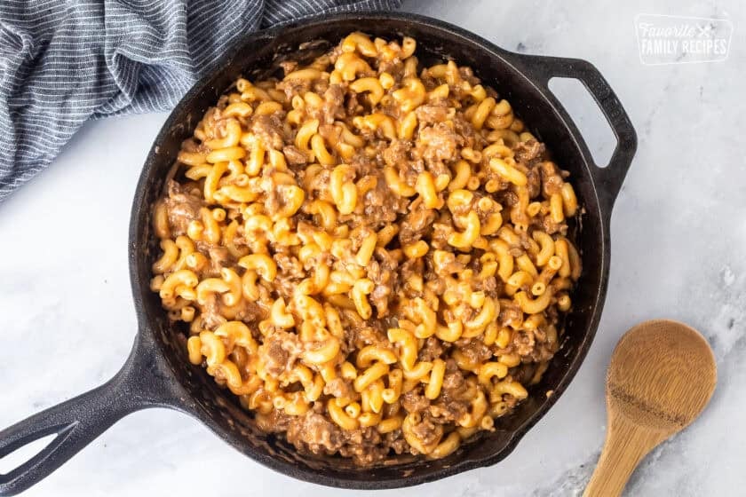 Beefaroni mixture with noodles added in a skillet.