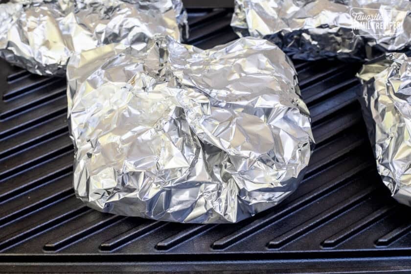 Cajun Foil Packets on grill top.