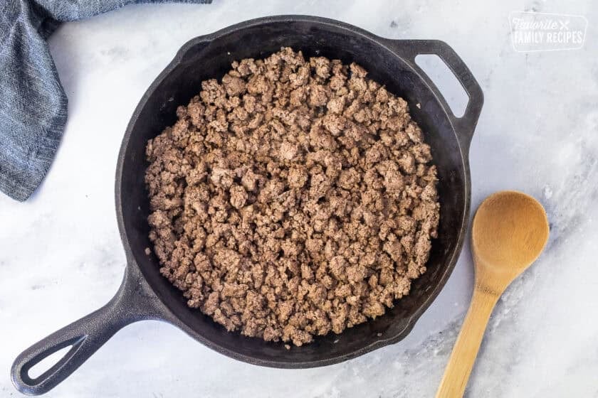 Skillet of browned ground beef.