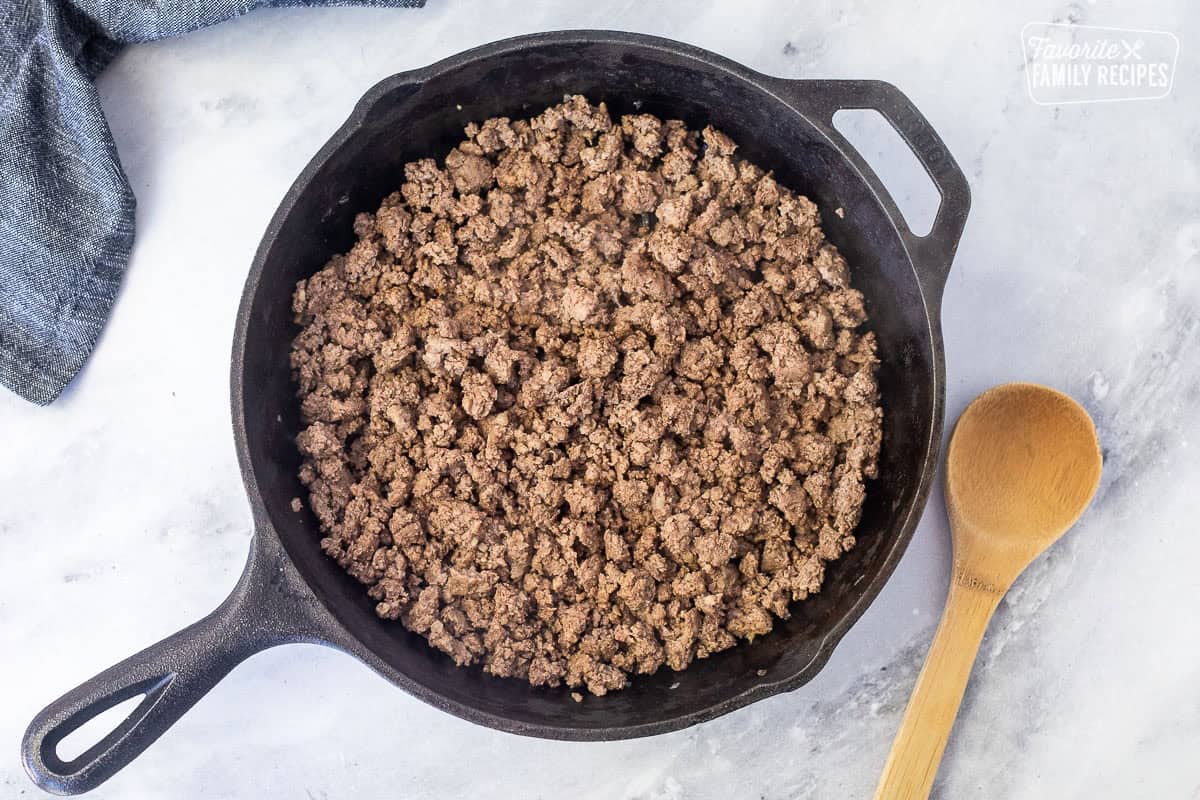 Skillet of browned ground beef.