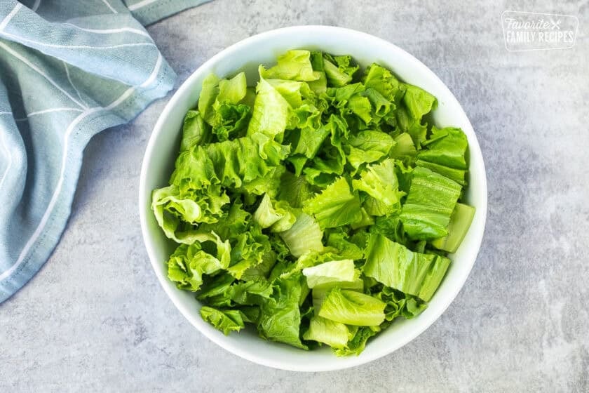 Bowl with cut lettuce.