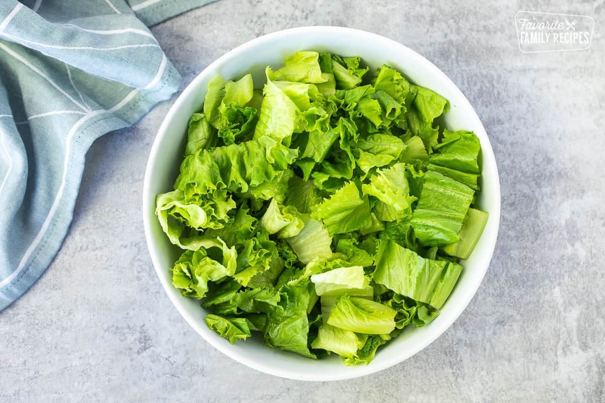 Bowl with cut lettuce.