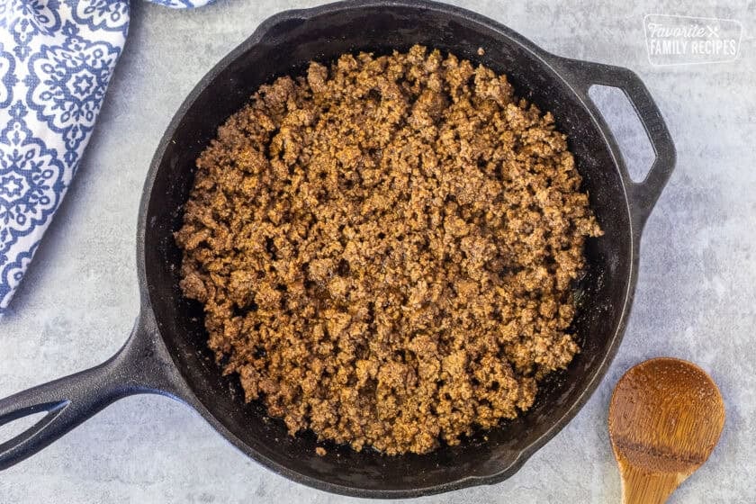 Skillet of seasoned ground beef for tacos.