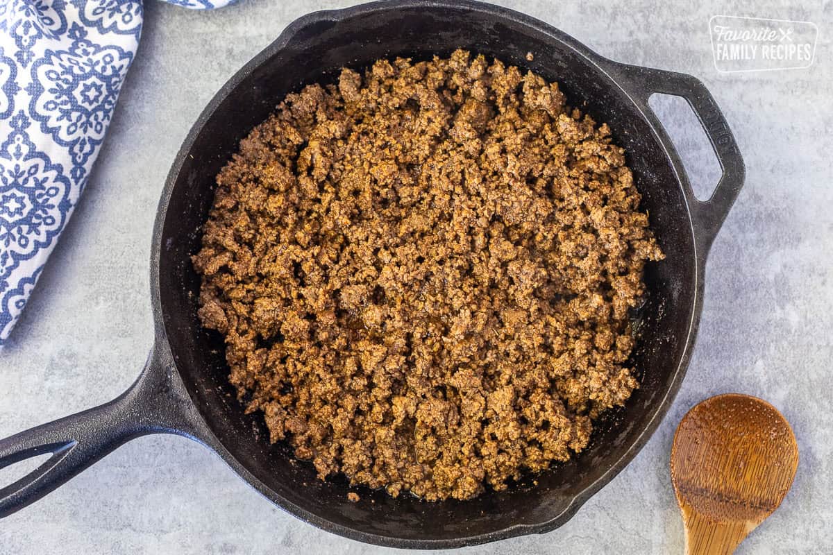 Skillet of seasoned ground beef for tacos.