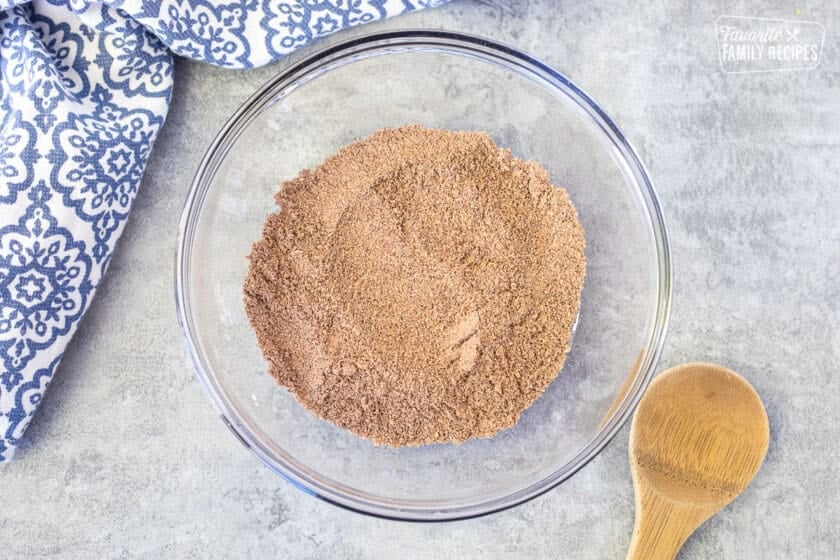 Glass bowl of ground beef taco seasoning.