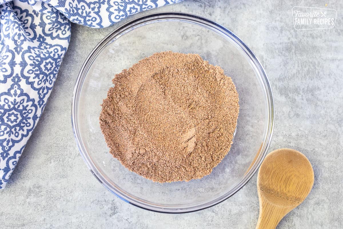 Glass bowl of ground beef taco seasoning.