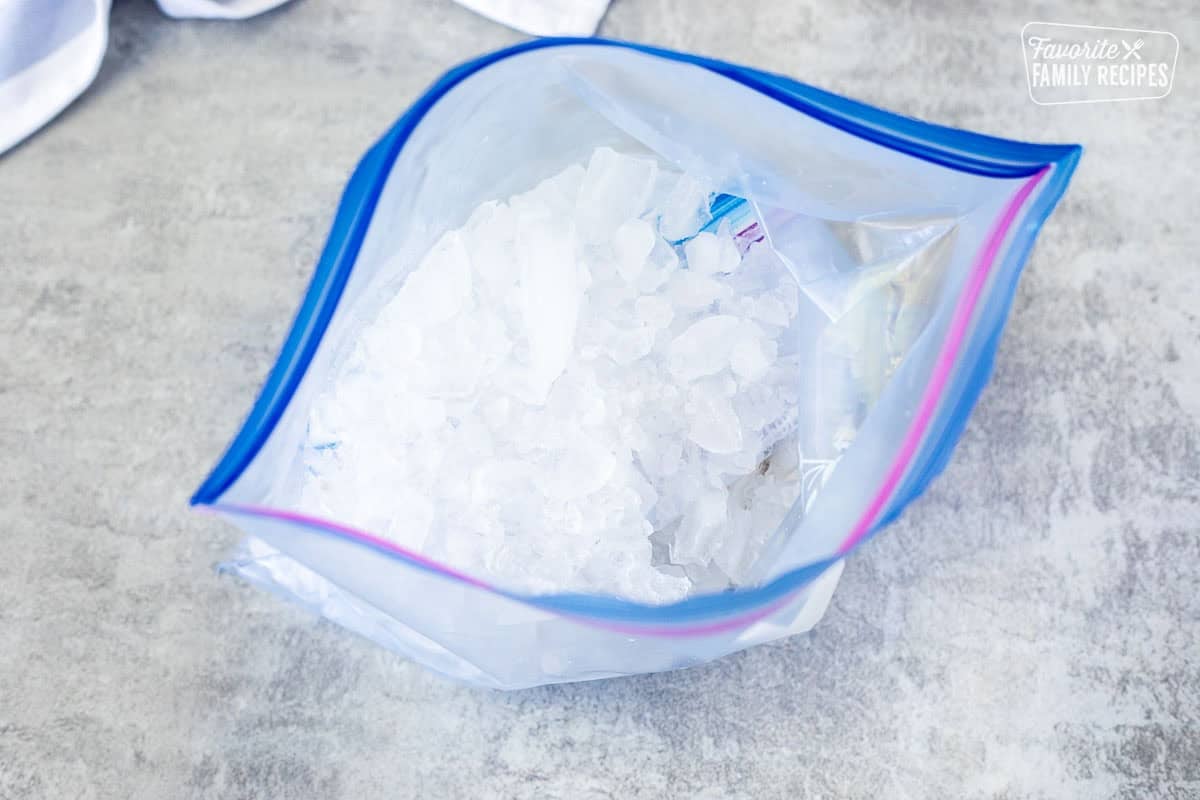 Crushed ice and rock salt over smaller bag in a large ziplock bag.