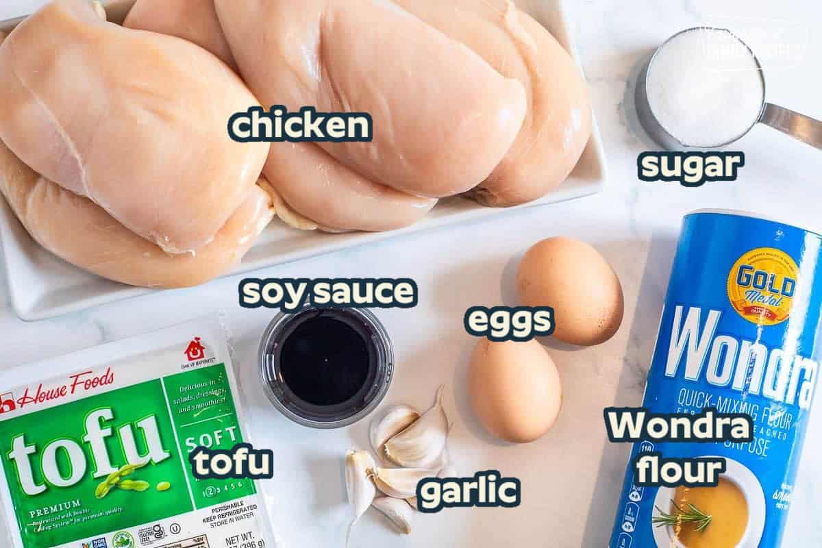 Ingredients to make Mafa Chicken including chicken breasts, garlic, tofu, egg, Wondra flour, sugar and soy sauce.