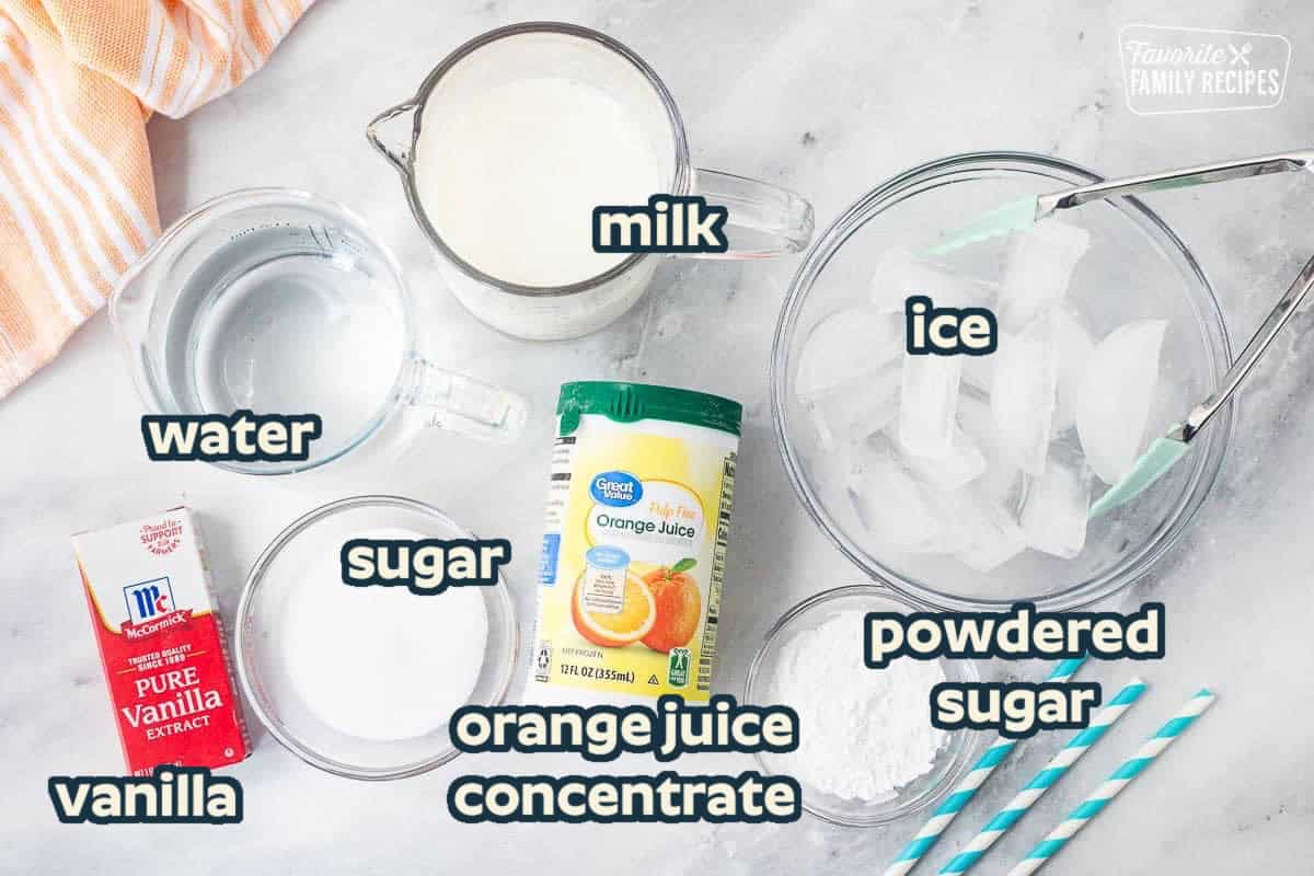 Ingredients to make an orange juilius including ice, powdered sugar, sugar, orange juice concentrate, milk, eater and vanilla.
